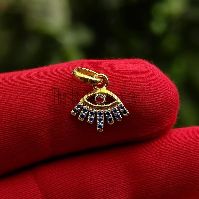 Blue Sapphire Evil Eye Pendant: 14k Gold Over Sterling SilverBlue Sapphire Evil Eye Pendant: 14k Gold Over Sterling Silver