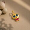 Gold Skull Pendant – Blue Sapphire Eyes, Ruby Teeth, Sterling Silver