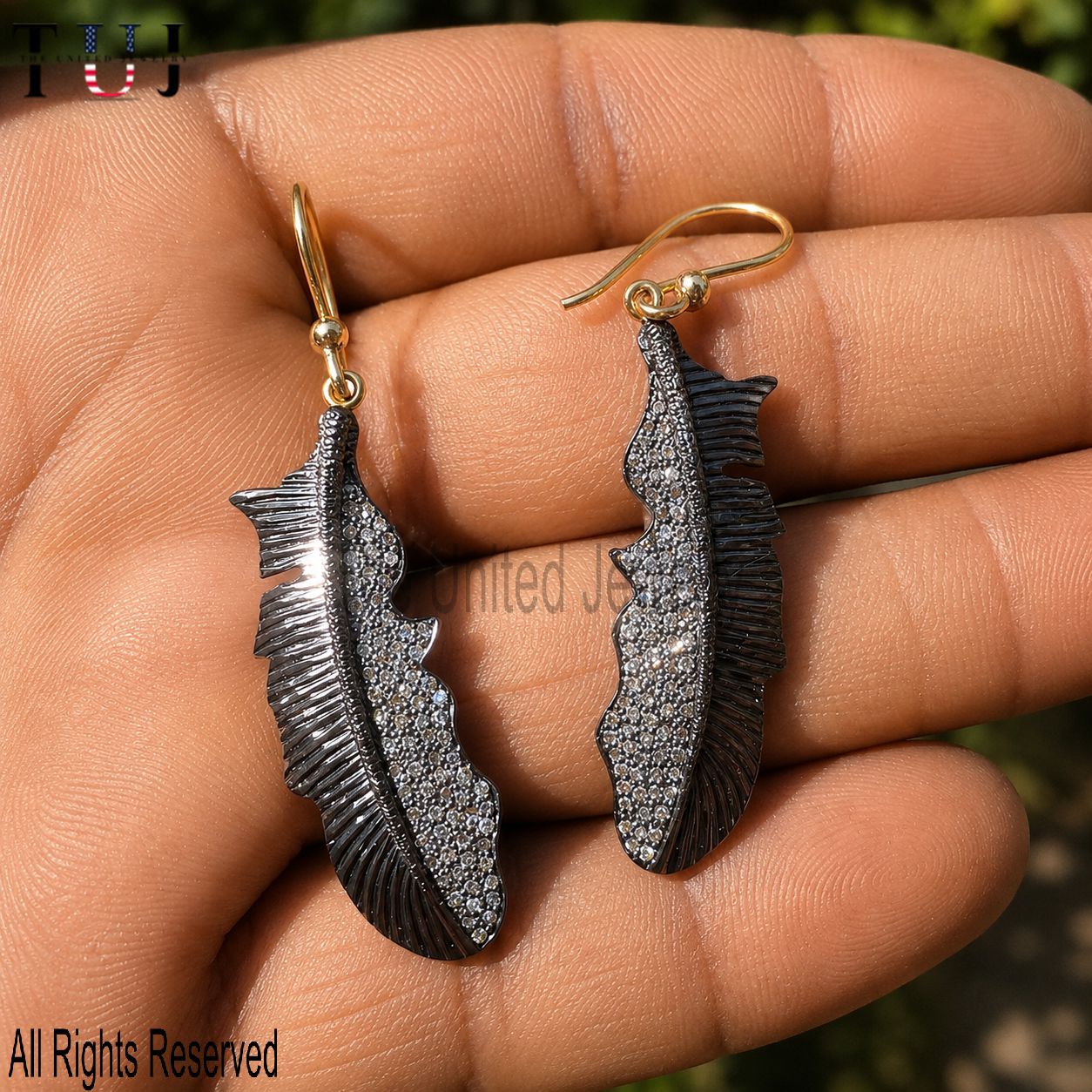Sterling Silver Feather Drop Earrings: Black Rhodium & Diamond Accent