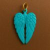 Turquoise Feather Wing Pendant: Hand-Carved Gemstone, Gold Plated Sterling Silver