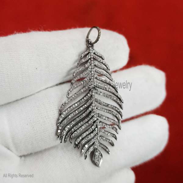 " Sparkling Feather Pendant in 925 Sterling Silver"