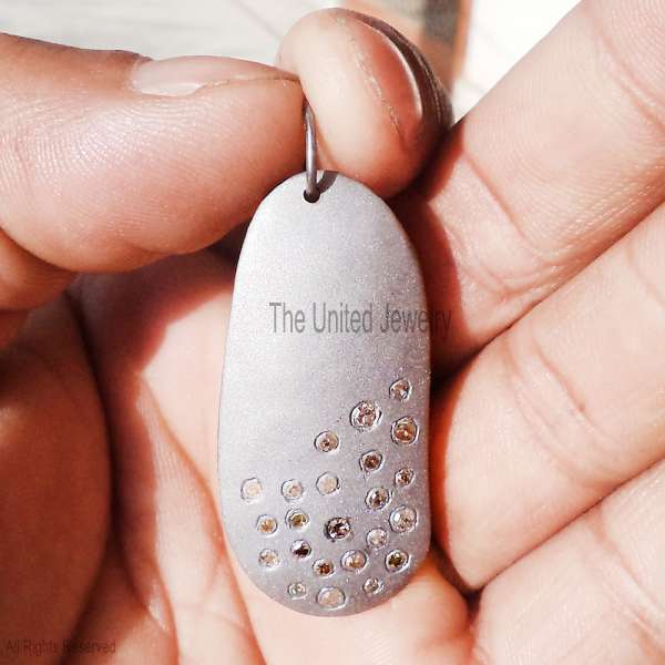 925 Sterling Silver Matte Pebble Pendant with Scattered Pave Diamonds