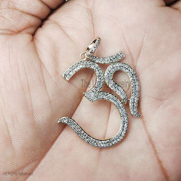 Pave diamond Om pendant by The United Jewelry